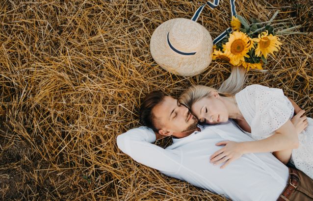 the 4 things you need to do before you find true love - image of a couple lying on the ground next to each other